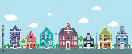 Colorful facades of the old houses on a city street cartoon Stoc
