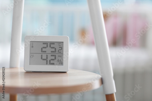 Digital temperature and humidity control in baby room photo