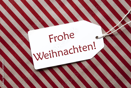 Label On Red Wrapping Paper, Frohe Weihnachten Means Merry Christmas