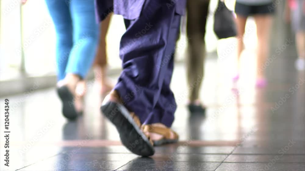 Low View of Travelers are walking with luggage in airports, Shallow Depth Of Field. Low View of Travelers are walking with luggage in airports, Shallow Depth Of Field.