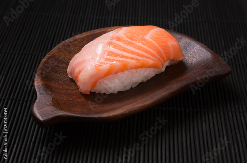 Fresh Sushi salmon on wood dish
