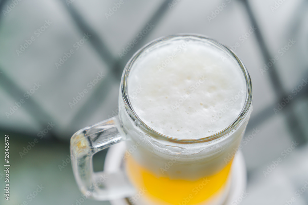 Mug with beer on table . Mug with beer on table .