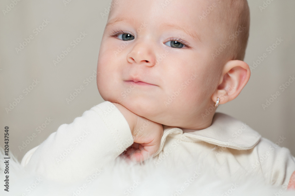 Portrait of the cute little girl close up