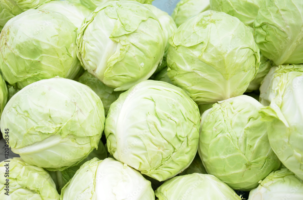 Fototapeta premium Green cabbages in a supermarket