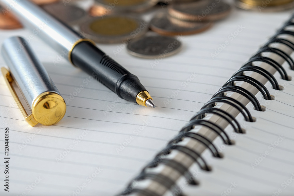 business finance. save money for investment concept coins and pe business finance. save money for investment concept coins and pe