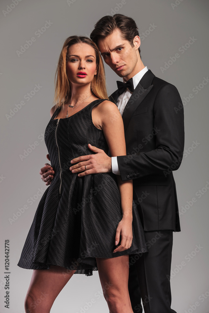 man embacing his woman from behind man embacing his woman from behind