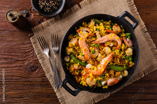 Traditional Spanish paella with seafood and chicken.