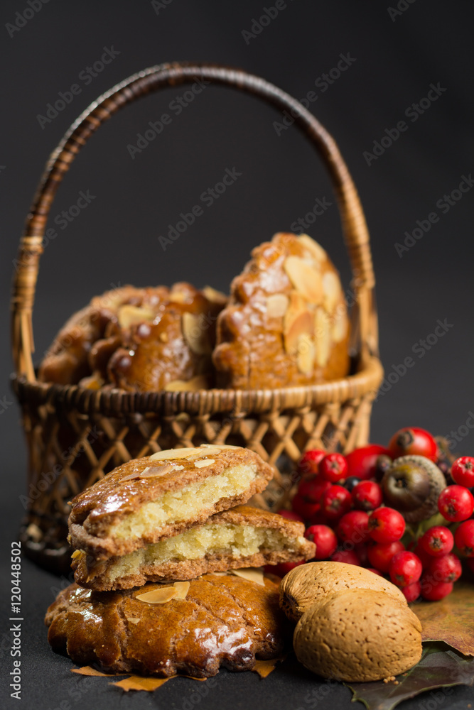 Typical Dutch filled spicy  cookies with almonds on autumn color