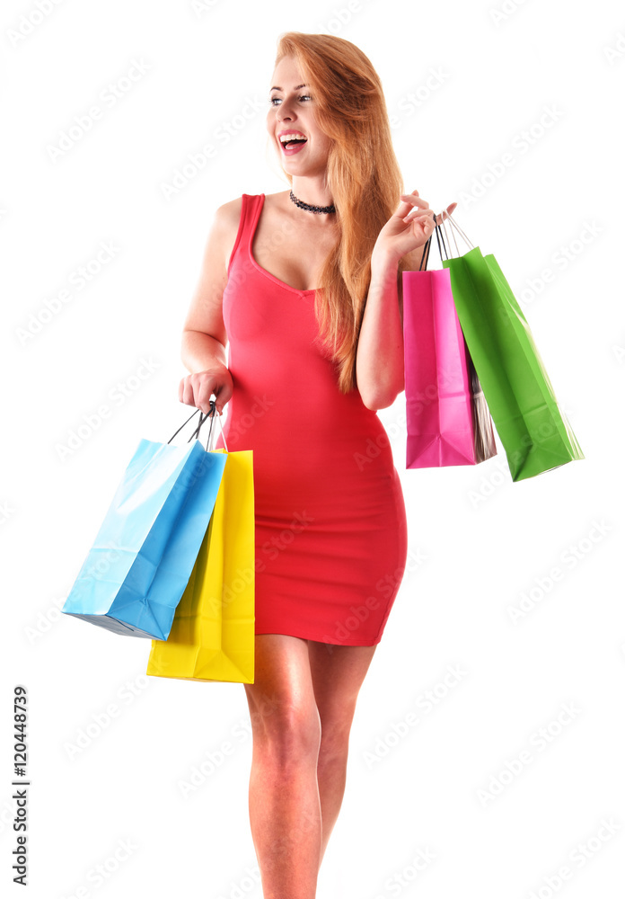 Young woman with shopping bags isolated on white Young woman with shopping bags isolated on white