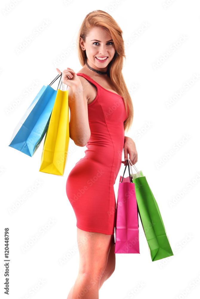 Young woman with shopping bags isolated on white Young woman with shopping bags isolated on white