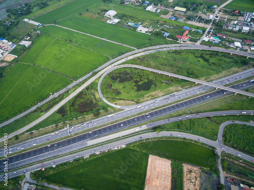 aerial view of traffic junction and transportation road in city,