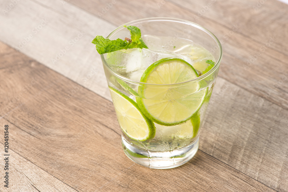 Drink for hot summer days. Fresh lime and lemon lemonade with mi Drink for hot summer days. Fresh lime and lemon lemonade with mi