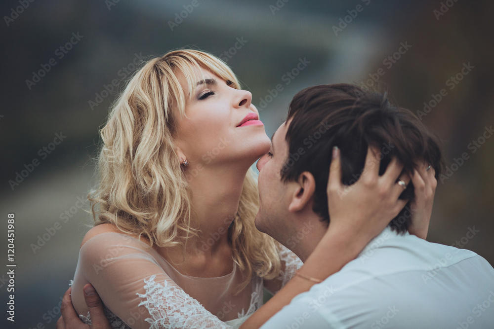 Closeup portrait of young gorgeous bride and groom Closeup portrait of young gorgeous bride and groom