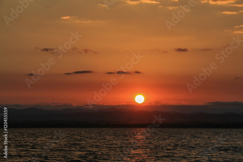 Sunrise landscape with blue sky on the lake with cloudy