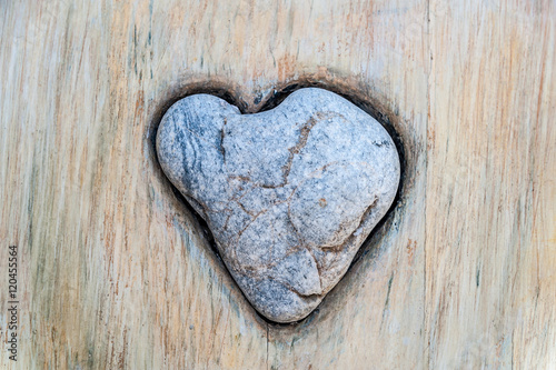 Heart of rock on a grunge wall