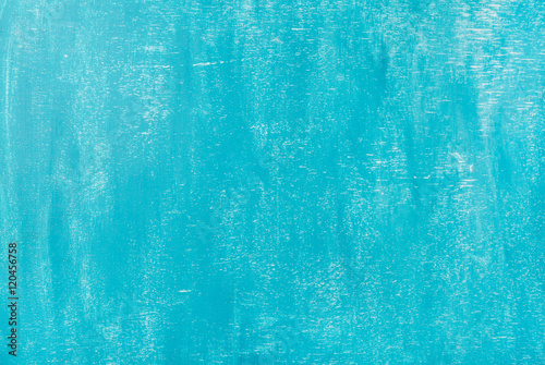Bright blue painted old plywood texture, background and wallpaper photo
