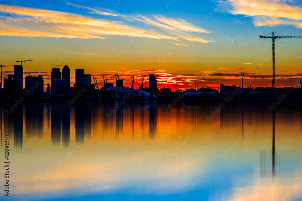 Silhouette of Canary Wharf, financial district of London at sunset
