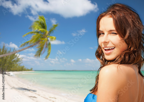 happy beautiful woman on tropical beach
