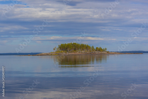 wooden house on the northern rocky shore