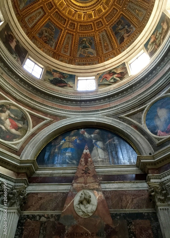 Basilica of Santa Maria del Popolo, Rome, Italy. The church contains many impressive works of art, including Rome's oldest stained-glass windows and two famous paintings by Caravaggio. 