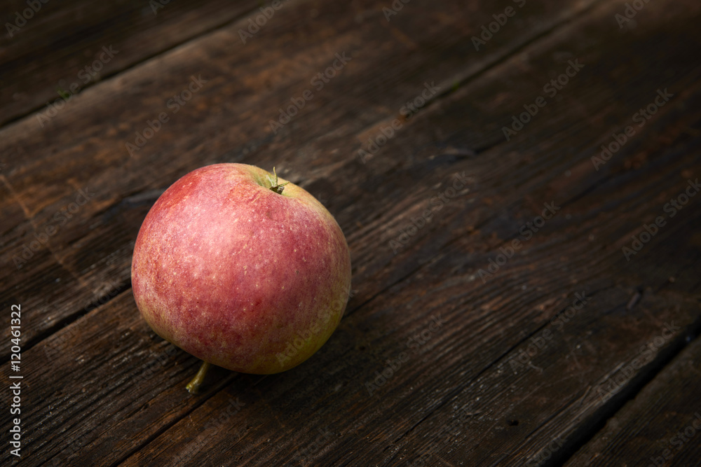 Apple on wooden boards background. Apple on wooden boards background.