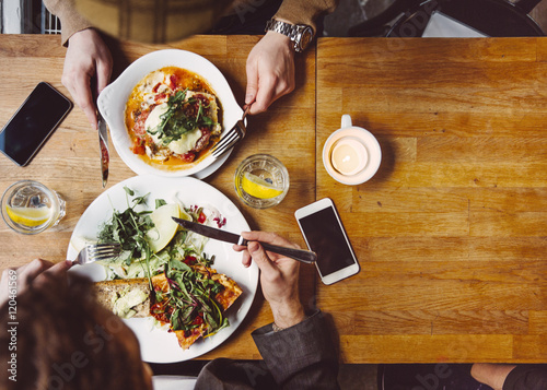 Sweden, Stockholm, Gamla Stan, Two men having lunch photo