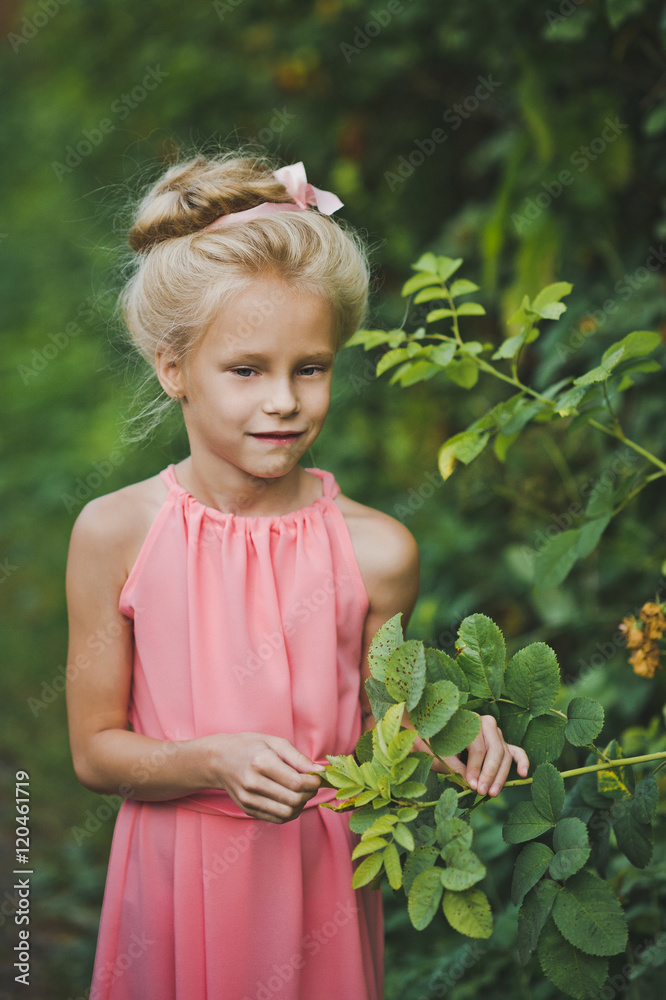 Portrait of a girl with hair and make-up among the bushes 6636. Portrait of a girl with hair and make-up among the bushes 6636.