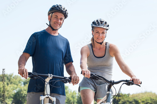 Senior couple cycling