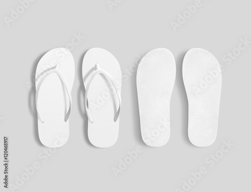 Pair of blank white beach slippers mockup, top and sole view 3d illustration. Home plain flops mock up template. Clear bath sandal display. Bed shoes accessory footwear. Rubber flipflops bottom view photo