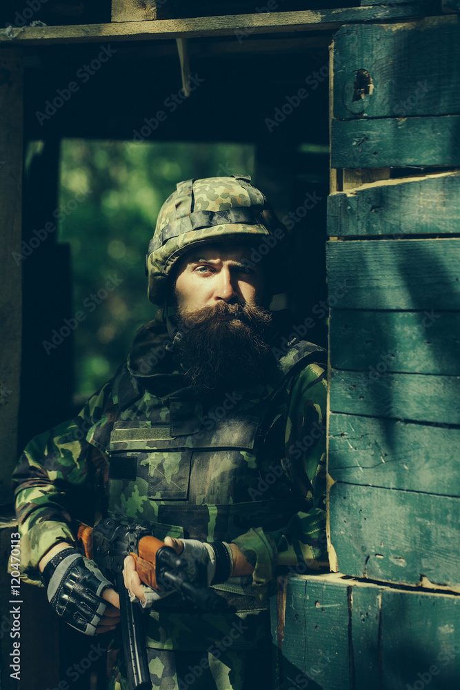 Portrait of soldier in camouflage Portrait of soldier in camouflage