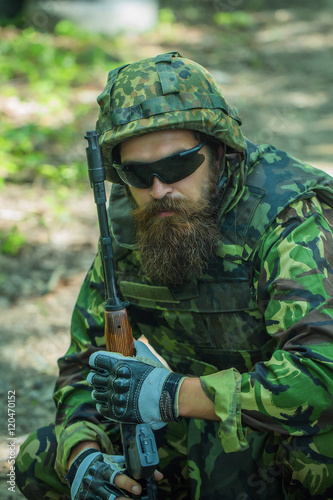 Portrait of soldier in sunglasses