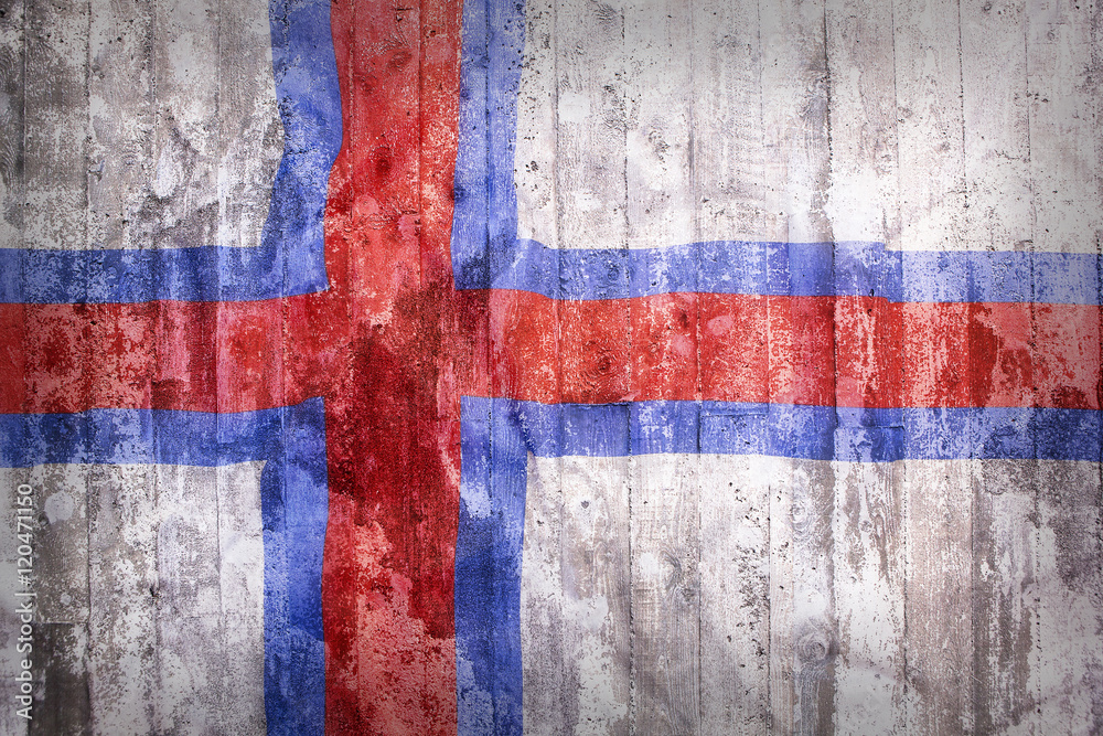 Fototapeta premium Grunge style of Faroe Islands flag on a brick wall