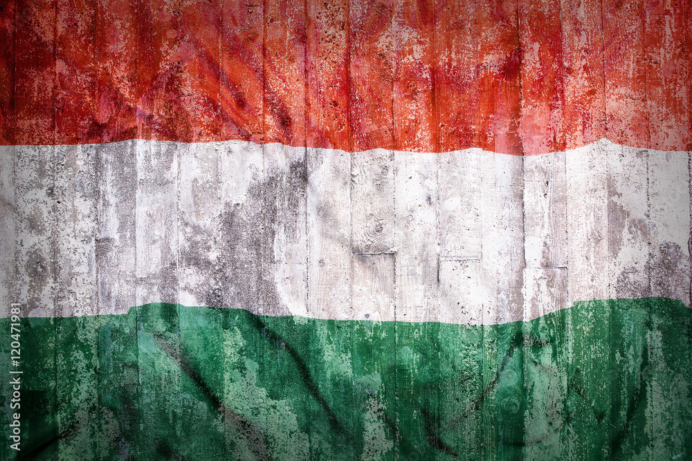 Grunge style of Hungary flag on a brick wall Grunge style of Hungary flag on a brick wall