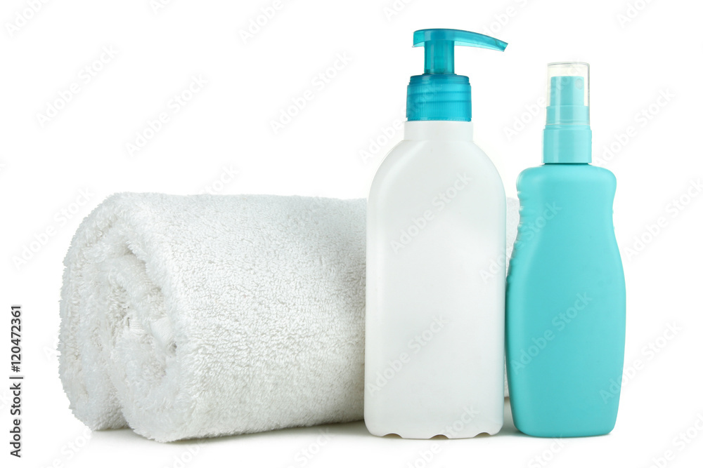 Sunscreens with a towel isolated on white background
