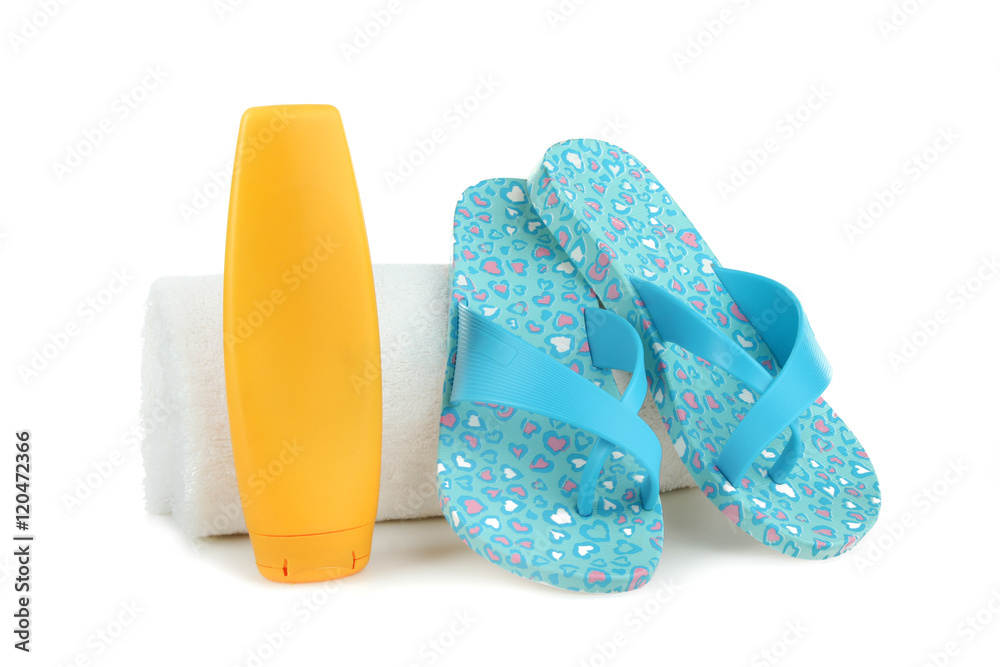 Beach flip flops with sunscreen on a white background isolated. Stock
