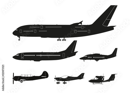 Set of black silhouettes of aircraft on a white background . Col