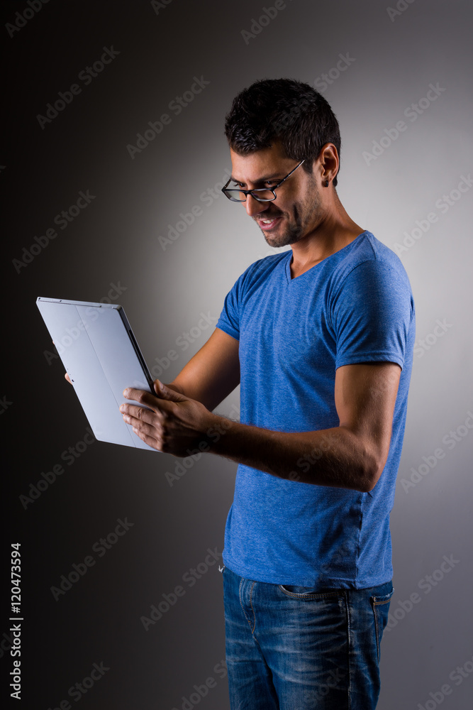 young male executive using digital tablet young male executive using digital tablet