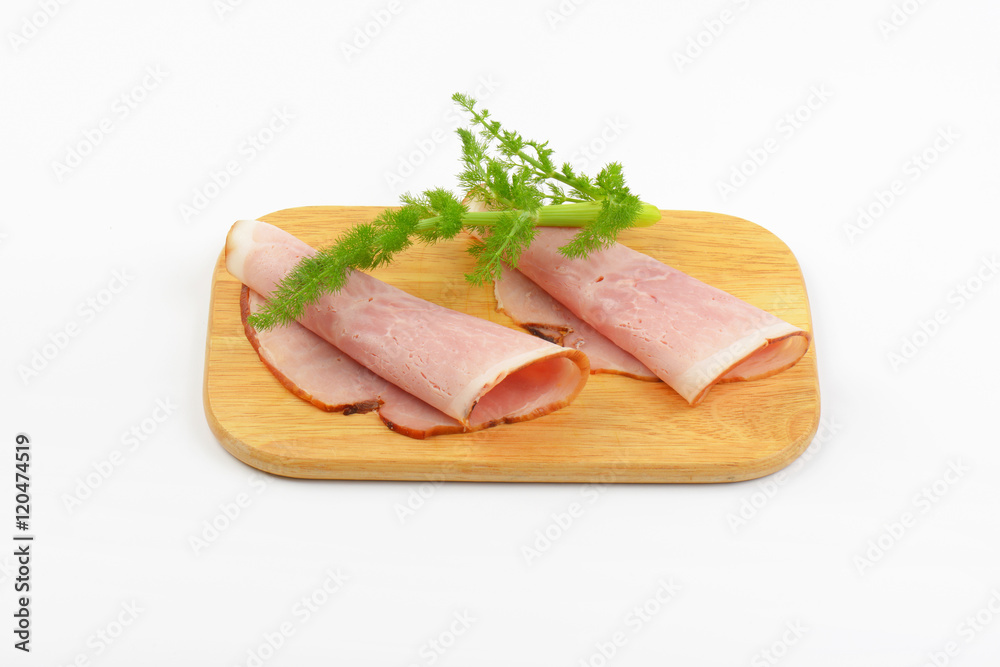 two ham slices with dill