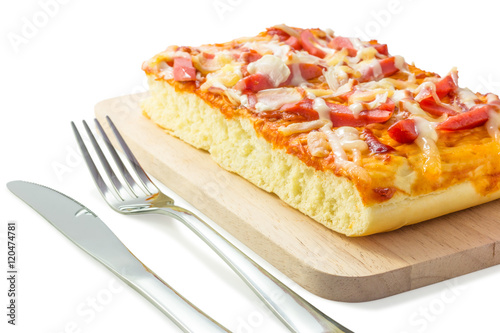 Homemade delicious fresh a slice of pizza on wooden plate.