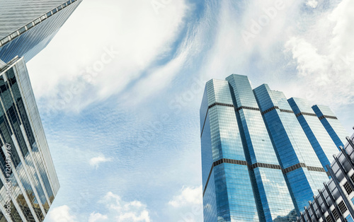 Buildings with the sky as a backdrop. And a business in the city. photo