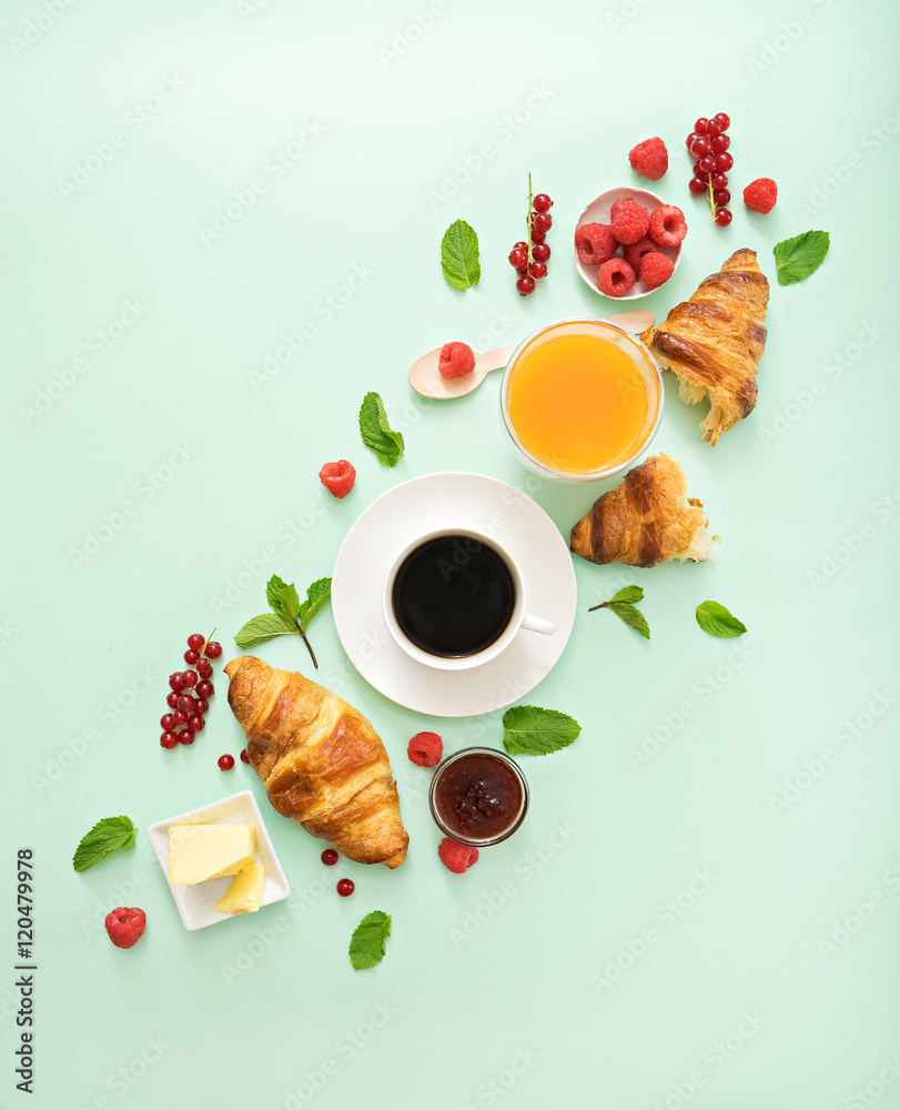 breakfast time with croissants and coffee on green table - obrazy, fototapety, plakaty 