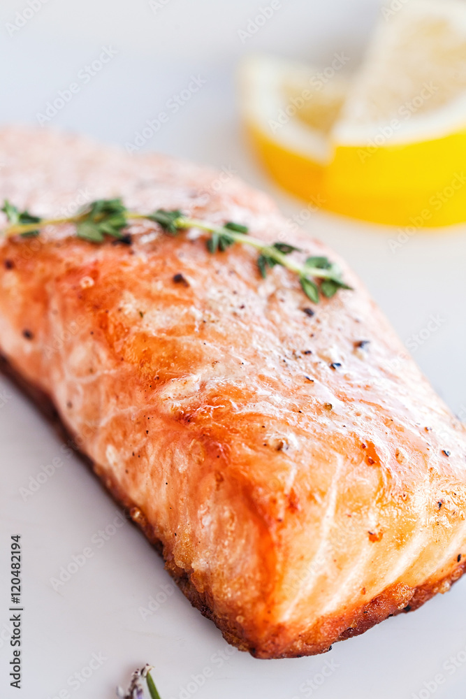 Fillet of salmon with lemon and sauce Fillet of salmon with lemon and sauce