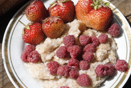porridge with berries on a plate