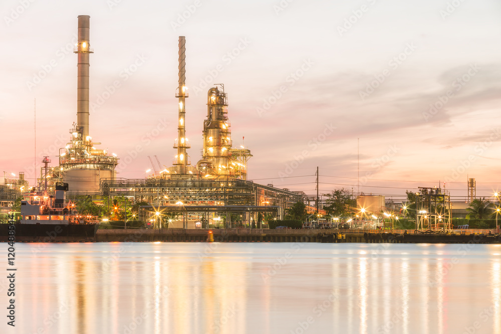 Oil refinery plant at dusk.