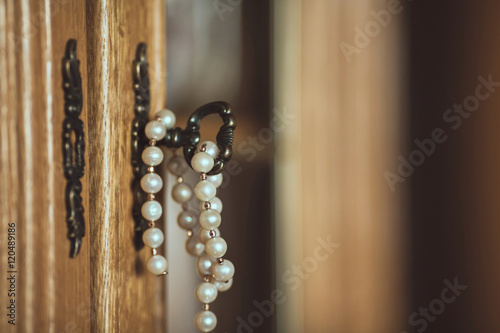 white pearls necklace in the key