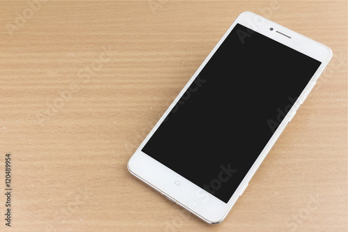 blank screen white smartphone on desk