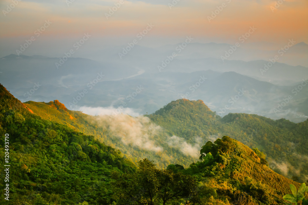 Misty On The Mountains / Fantastic Dreamy View Of Misty At The Soft Glowing Light From The Sky On The Mountains Landscape.