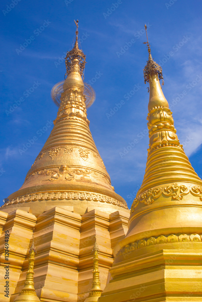 Fototapeta premium Myanmar pagoda golden color in temple at Myawaddy