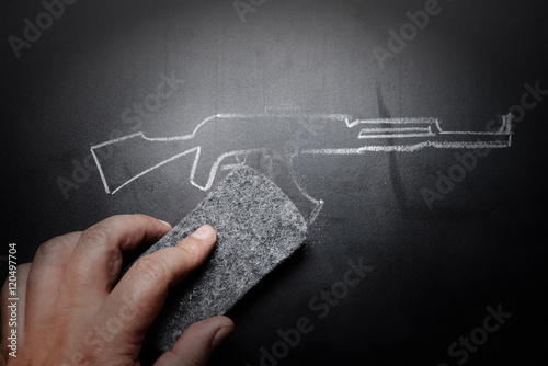 weapon draw erased on blackboard - no violence concept