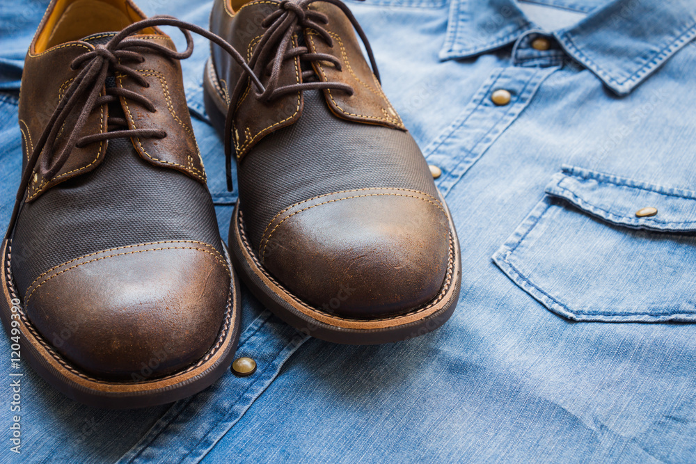 Men's casual outfits with jeans shirt and brown shoes on gray background